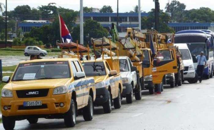 Power line technicians are ready for recovery efforts after the passage of Hurricane Melissa.