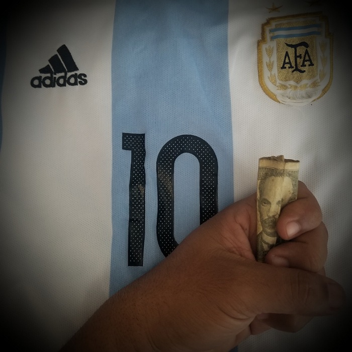One peso bill that served as an amulet for the author during the Qatar 2022 World Cup.