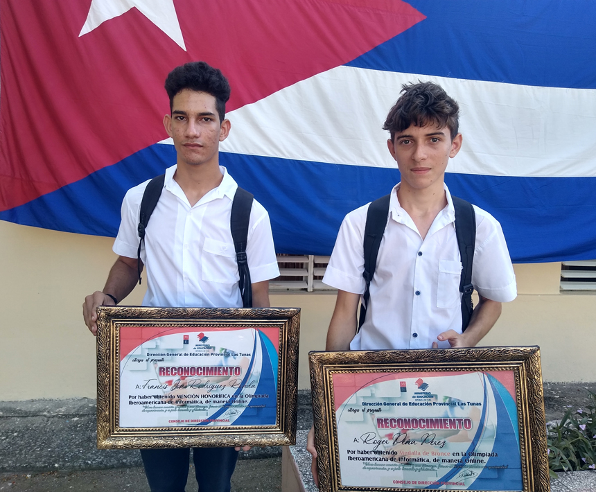 Francis and Roger, award-winning students in the Ibero-American Computer Sciences Olympiad