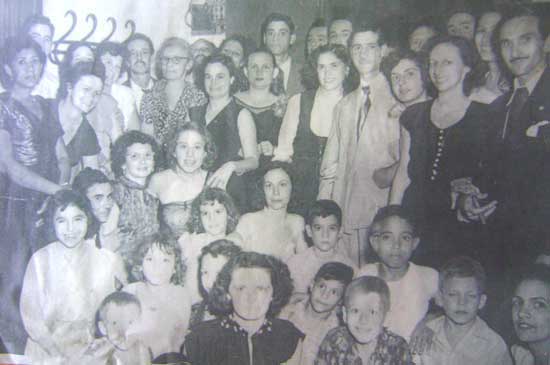   The marriage of Charles Peiso and Iria Mayo produced a large family, as seen in this photo from a few decades ago.