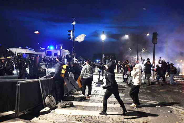 258 arrests occurred in Paris, where police used tear gas and water cannon