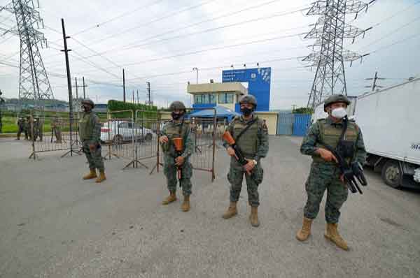 Members of the Ecuadorian Marine Force guard the Zone 8 Deprivation of Liberty Center in Guayaquil, Ecuador. 