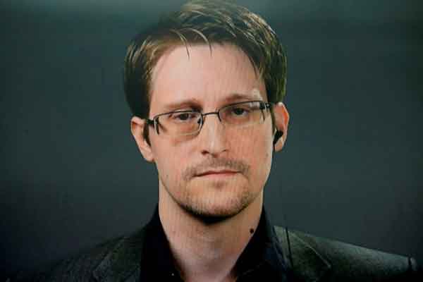 Snowden has been living in Russia since 2013 to escape prosecution in the US after leaking classified documents detailing government surveillance programmes Photo: Brendan McDermid / Reuters