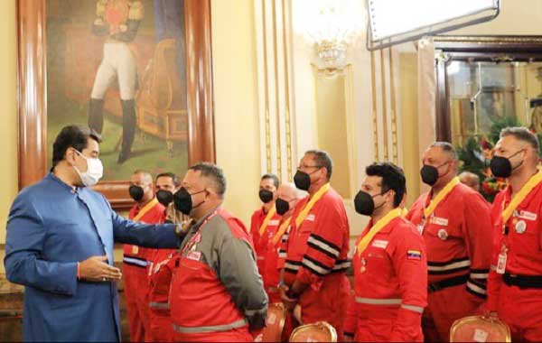 Ceremony to decorate the firefighters and experts of the state-owned Petróleos de Venezuela (PDVSA), who intervened in extinction of fire of significant proportions in the industrial zone of Matanzas