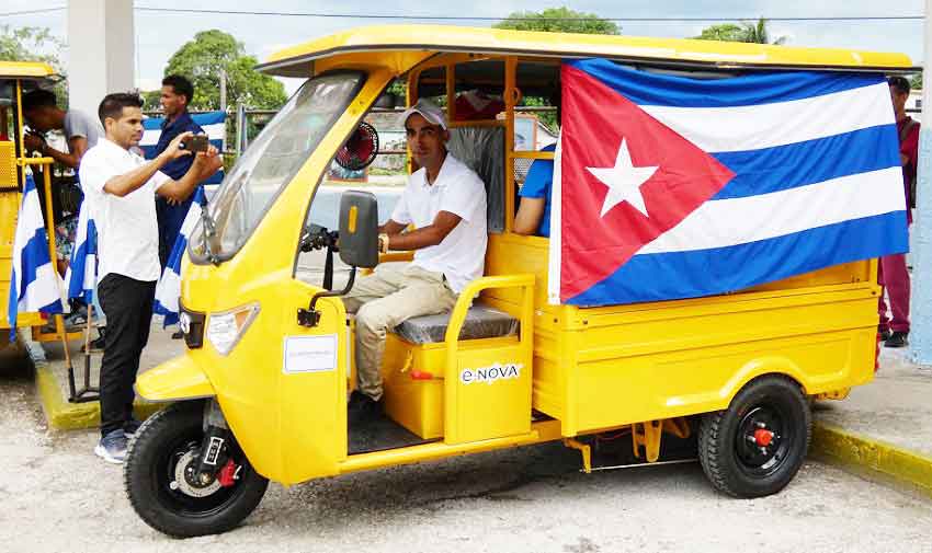 Electric tricycles provide local transportation in "Colombia" and "Amancio."