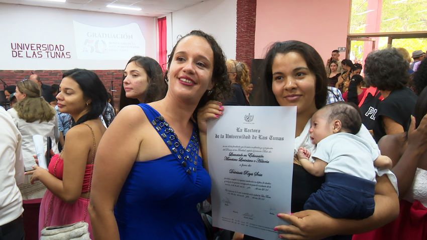 The family celebrated with the new graduates.