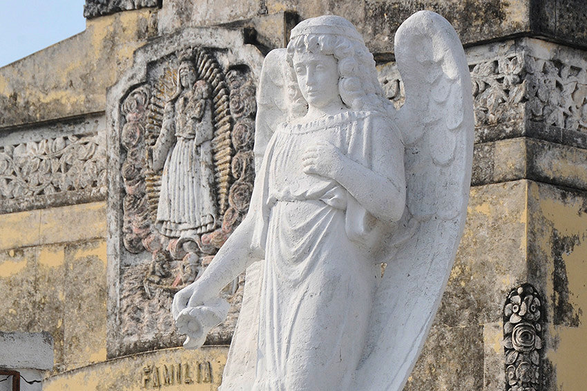 Funerary art at Major General Vicente García Municipal Cemetery, Las Tunas.