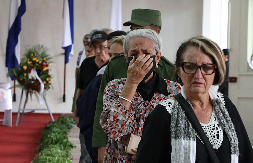 The people expressed their respect before the photographs of the combatants at the Vicente García Memorial Museum.