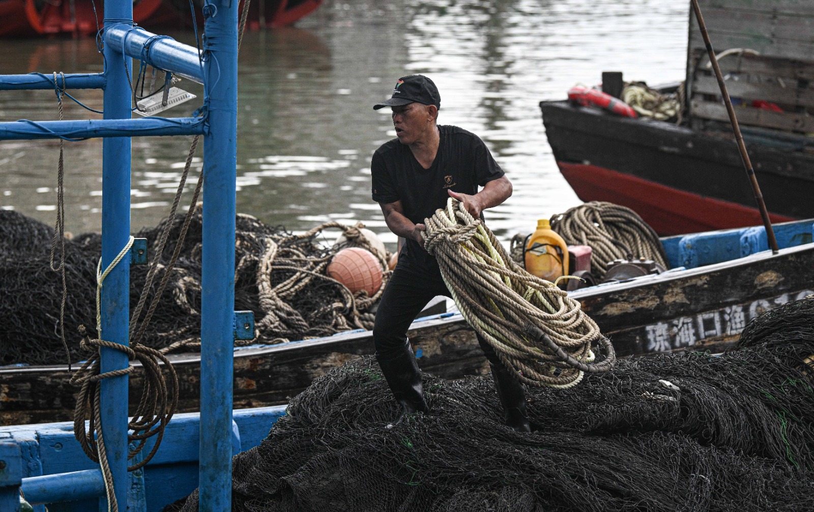 China La pesca china y el otro juego del calamar 3