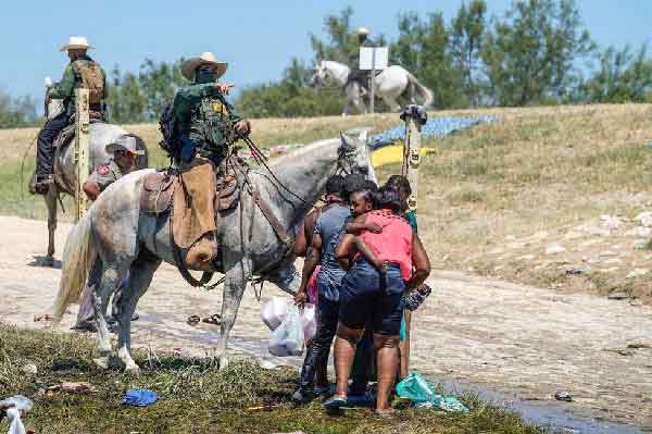 State Department attorney blasts Biden for inhumane expulsions of Haitians
